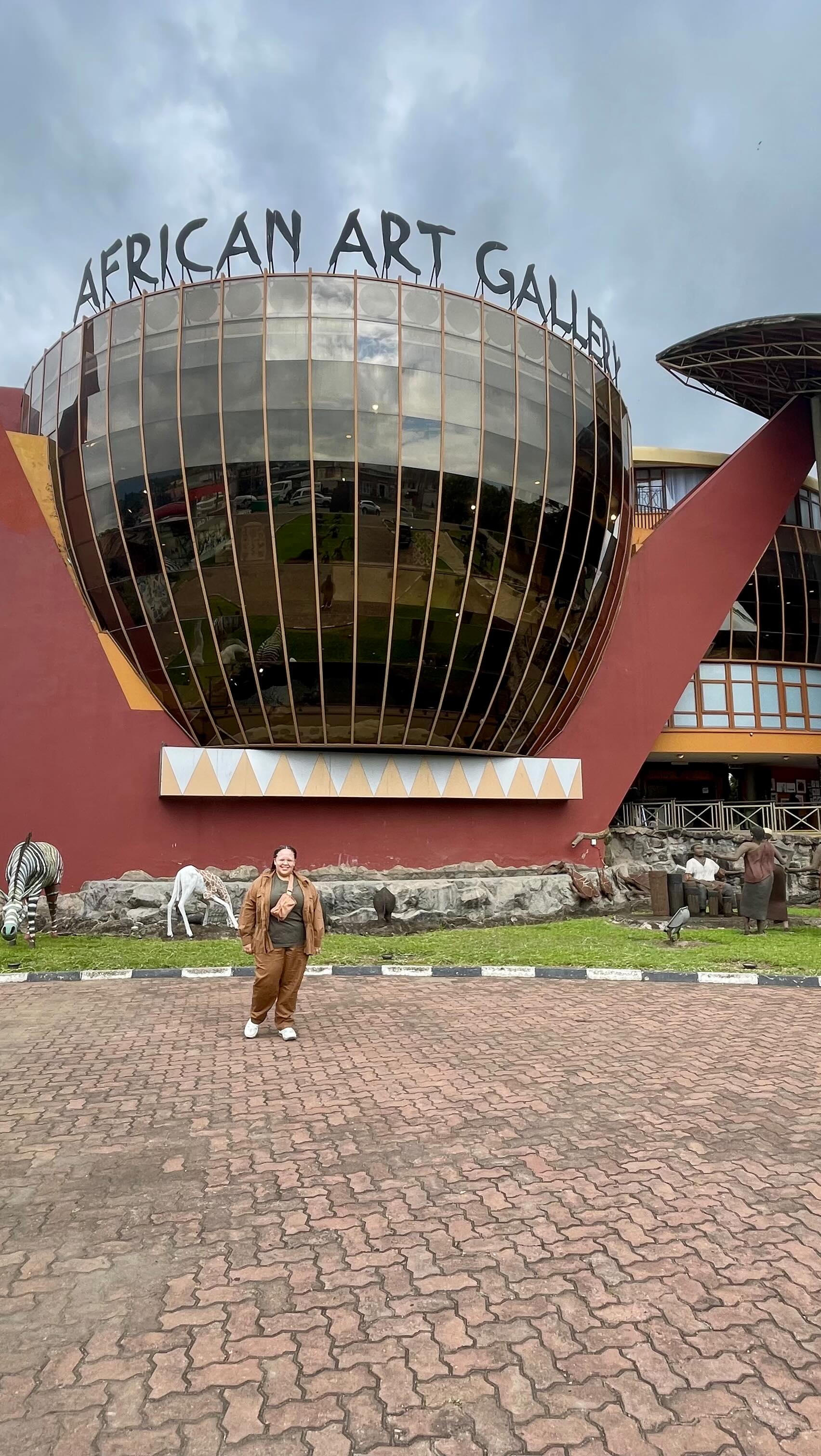 Stepping into the African Art Gallery & Cultural Center felt like entering a treasure trove of history and culture! As home to one of the largest art exhibitions on the continent, the collection is nothing short of breathtaking—from intricate woodcrafts and statues to antique Zanzibar doors and stunning paintings. Among its treasures is the Family Tree of Life, Ujamaa, a sculpture that took 20 years to create.

This space isn’t just about art—it’s about preserving and celebrating Africa’s rich cultural heritage. If you love art, history, or cultural exploration, this is a must-visit!

#AfricanArt #CulturalHeritage #ExploreAfrica #ArtLovers #AfricanCulture #TravelAfrica #GirlWithHerViews